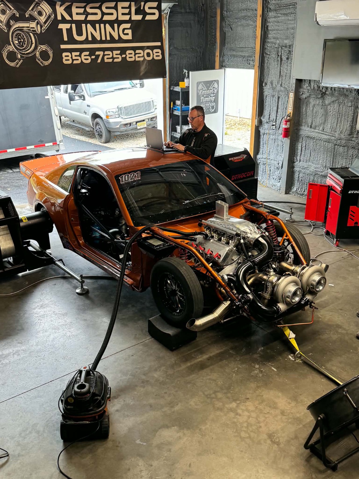 Bill at the laptop revising a calibration on the dyno
