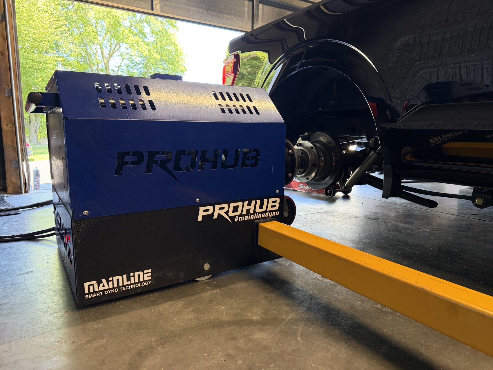 The shop ProHub dyno unit with a vehicle hub mounted to it